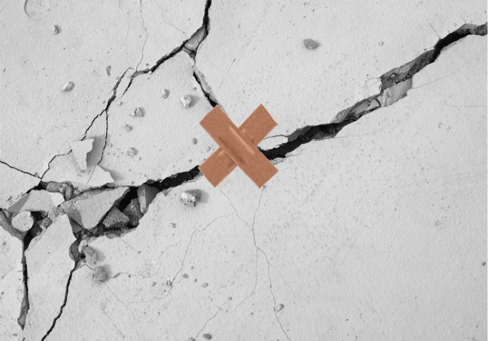 Sticking plaster on cracked wall
