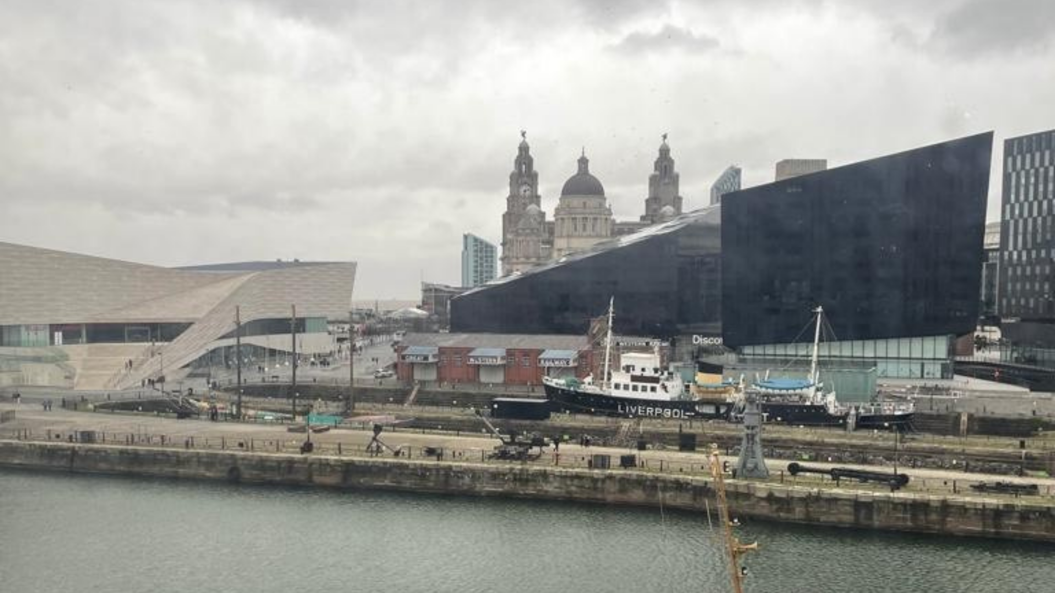 International Slavery Museum in Liverpool; a large, angular glass building by the river.