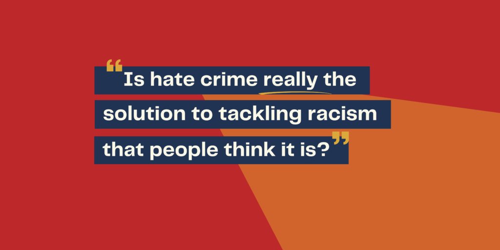 Red and orange background. Text highlighted in blue reads: "Is hate crime really the solution to tackling racism that people think it is?"